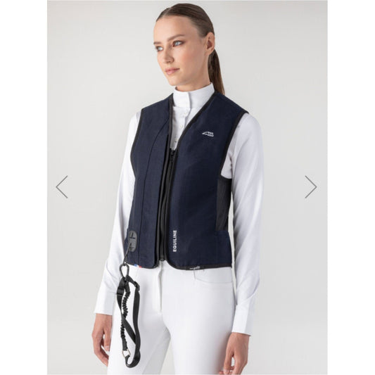 Woman wearing a navy Belair Airbag Vest - EqiSafe